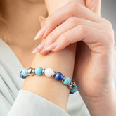 Elegant women's bracelet featuring Belomorite, Lapis Lazuli, and Turquoise – side angle.